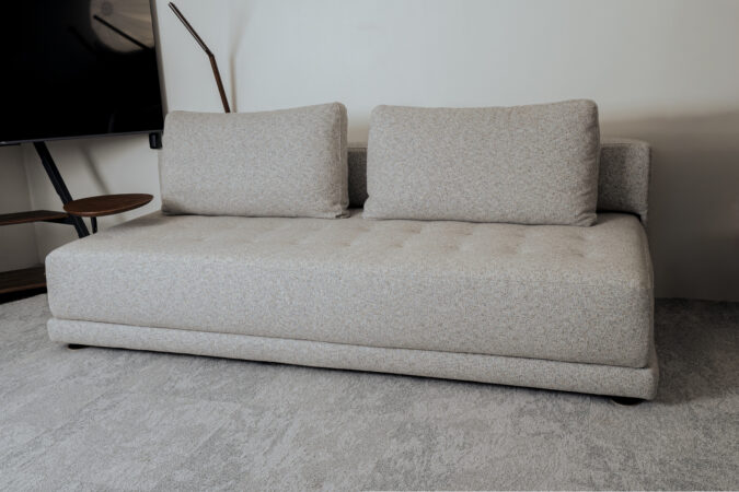 Tufted Sofa in Light Gray Fabric with Round Wood Laptop Table